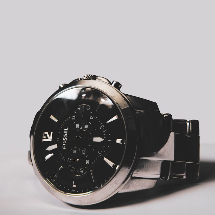 Before: wristwatch product photo on grey background